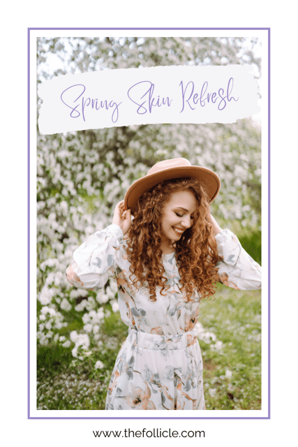 Woman in floral dress, spring garden background.