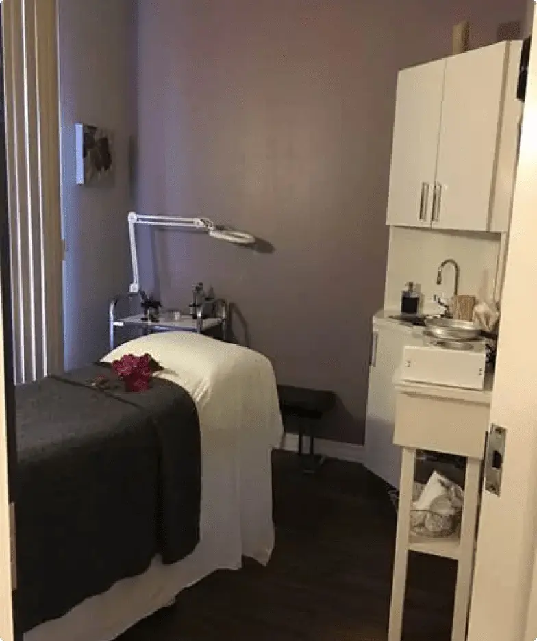 Spa treatment room with massage table. Spa treatment room with massage table.