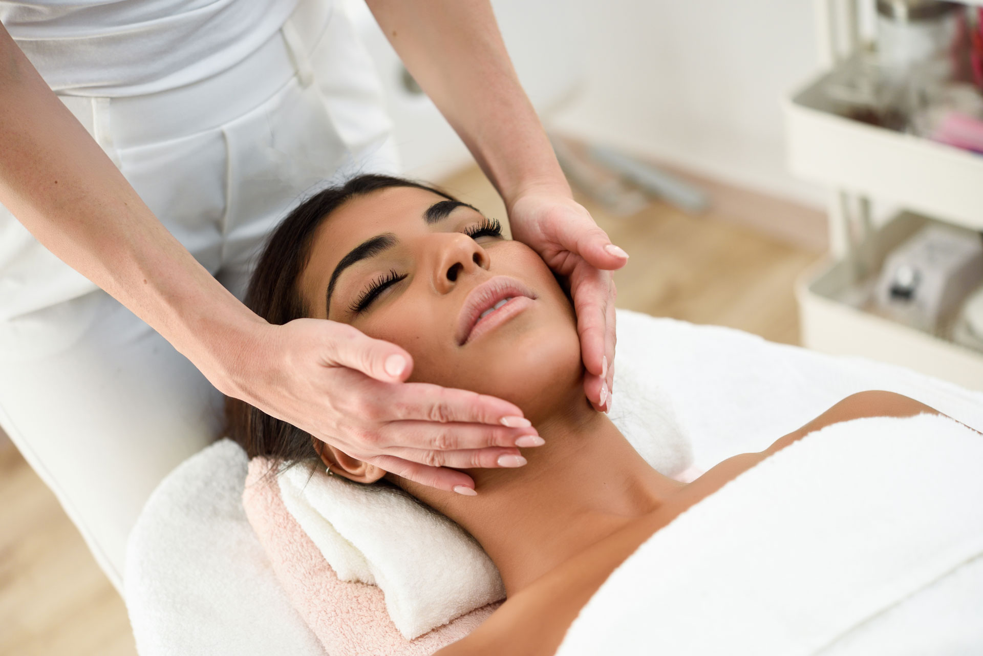 woman receiving head massage