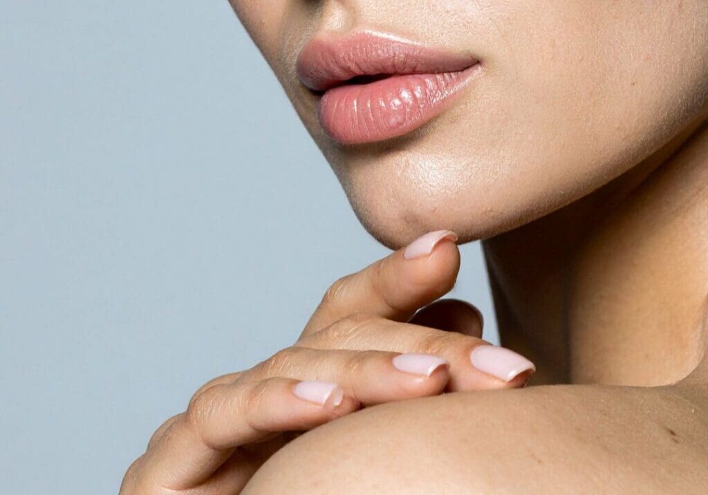 Close-up of a woman with smooth, glowing skin